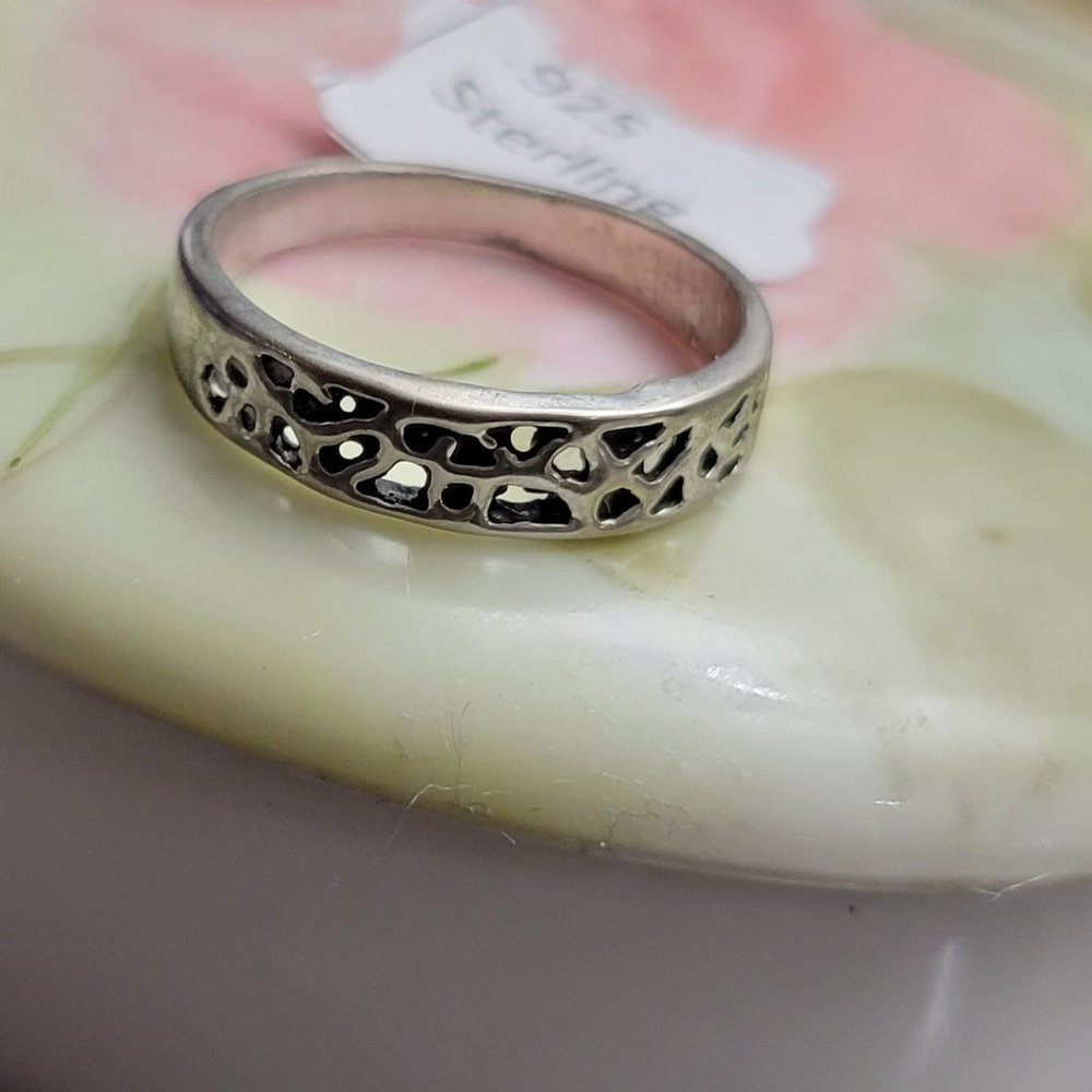 Wedding band Impressionist Sterling Ring size 7 And is 8mm wide